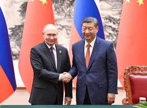Xi talks with Putin via video meeting