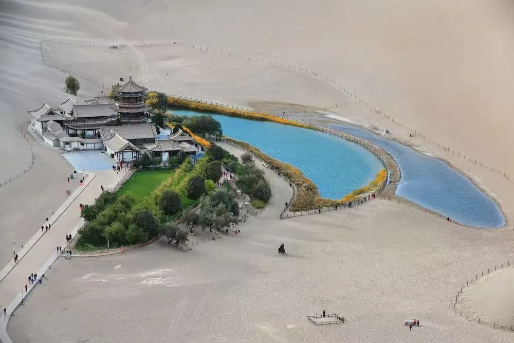 International media visits Cresent Moon Lake, Mingsha Mountain Scenic area in Dunhuang, China